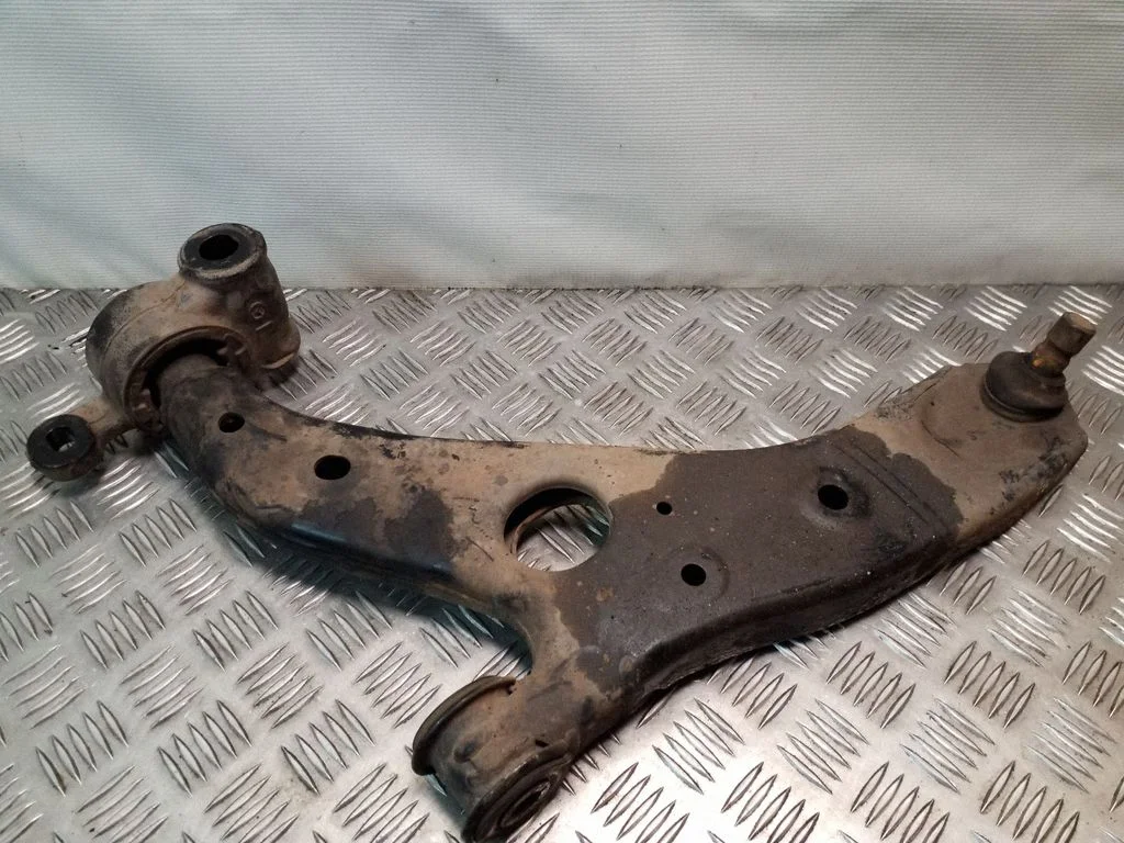 Front lower control arm/wishbone – left