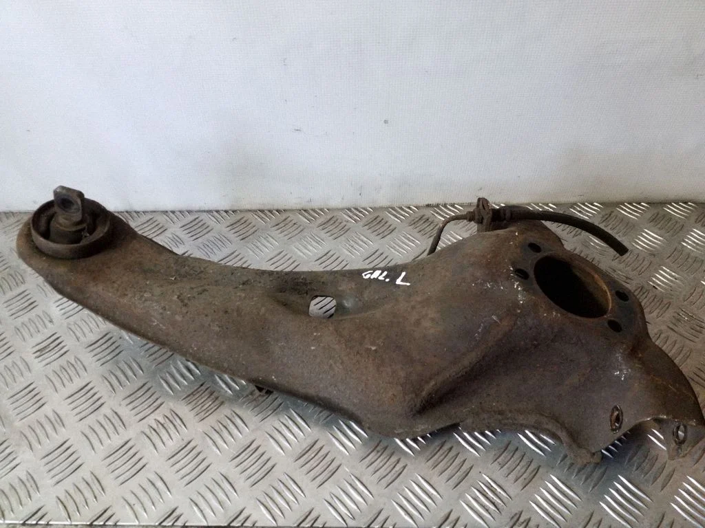 Rear upper control arm/wishbone – left