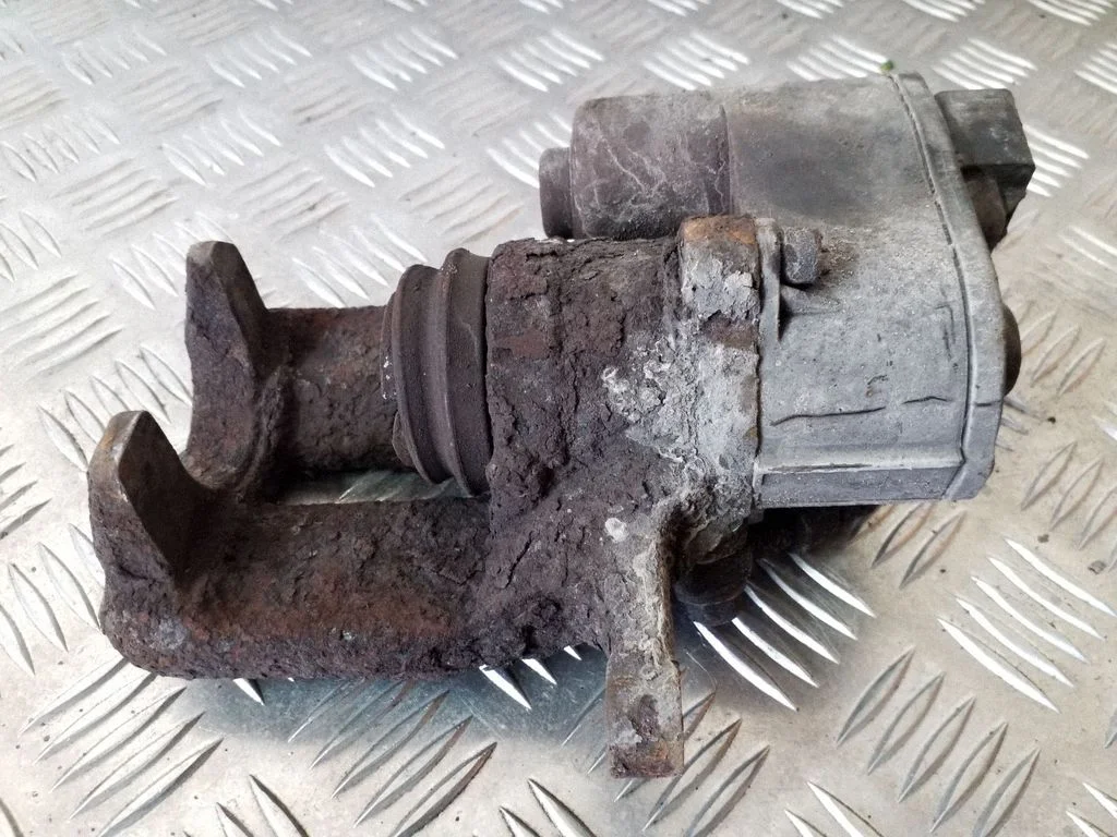 Rear brake caliper – right