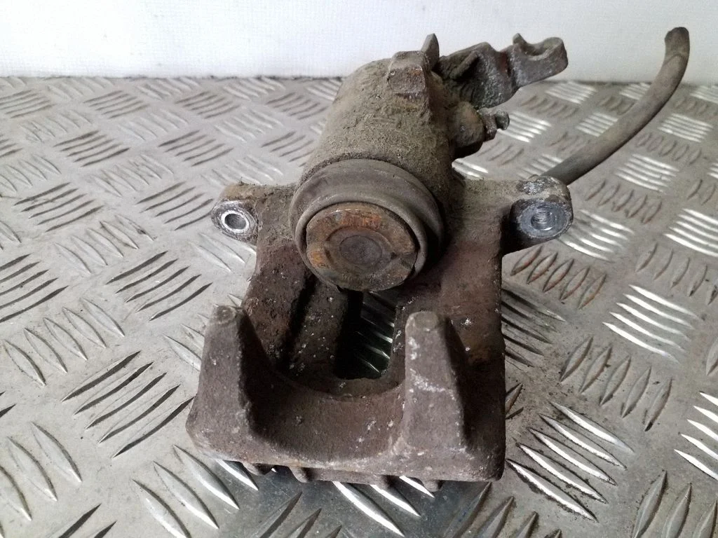 Rear brake caliper – right