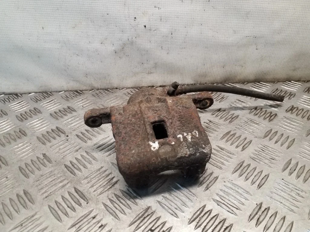 Rear brake caliper – right