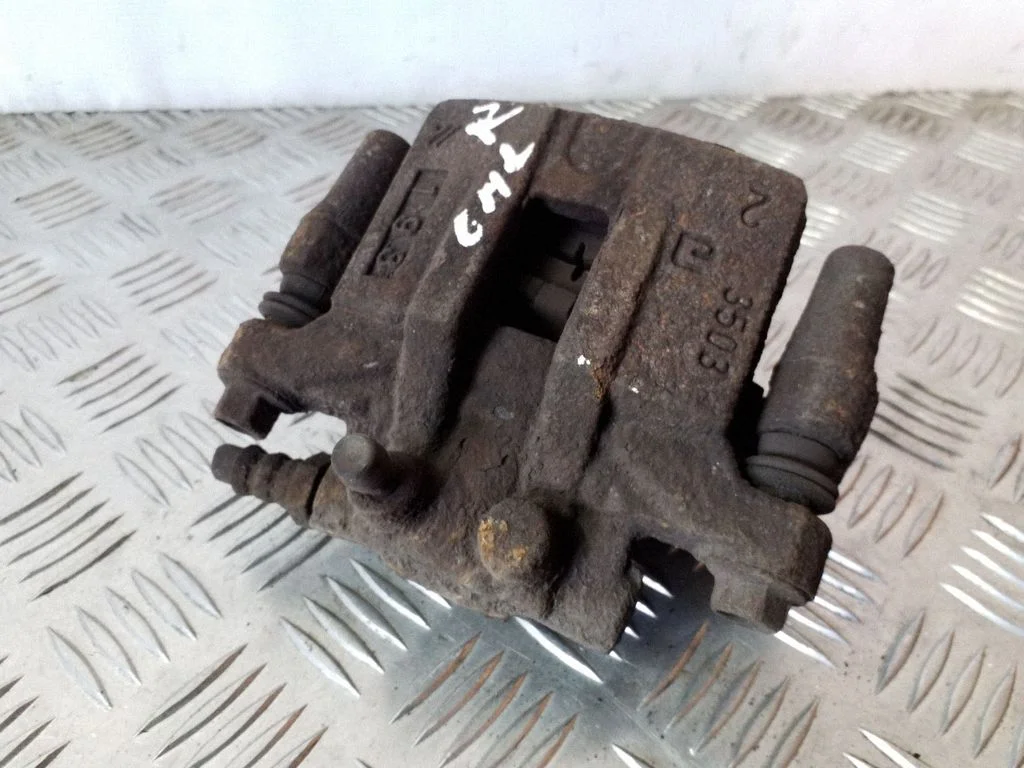 Rear brake caliper – right