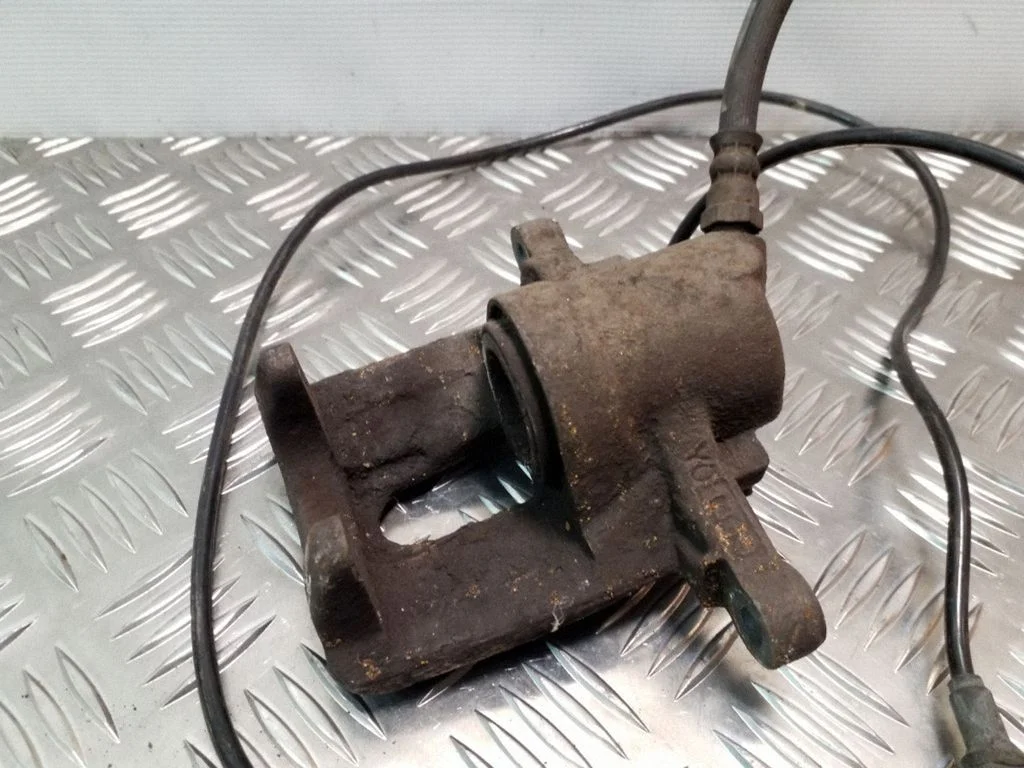Rear brake caliper – right