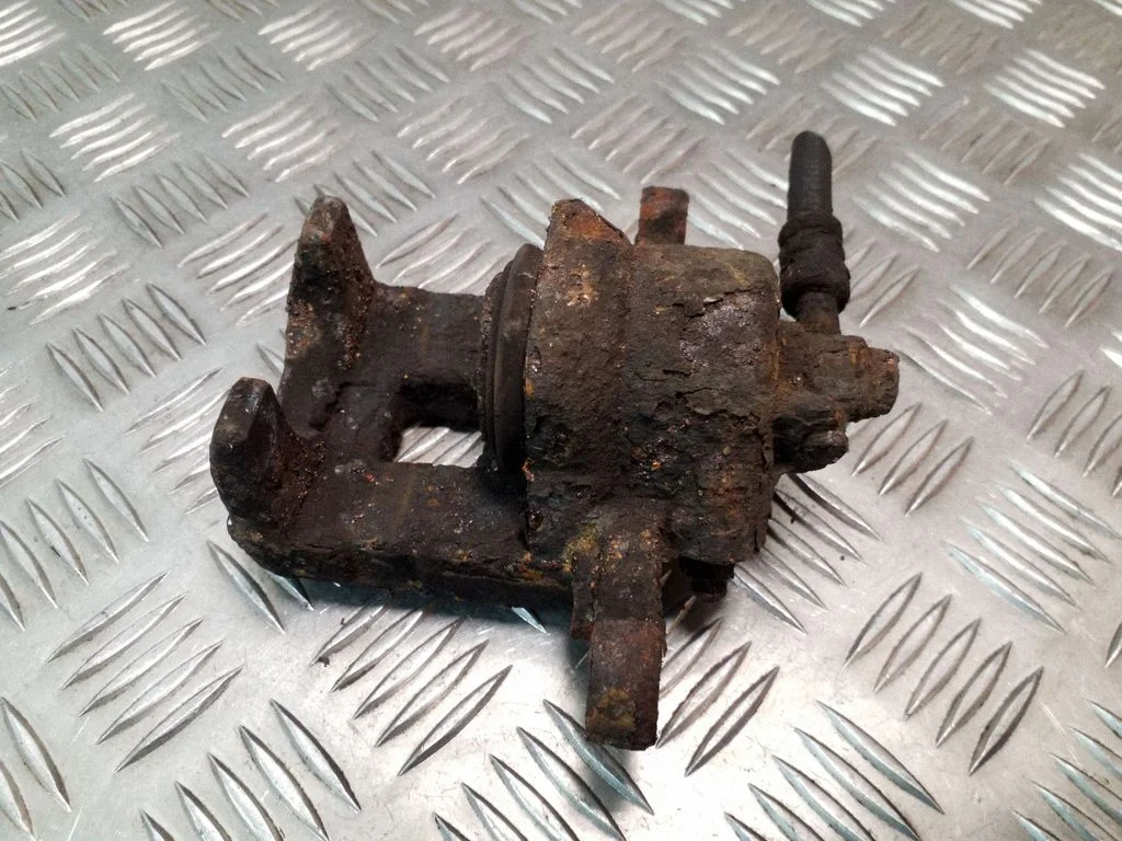 Rear brake caliper – right