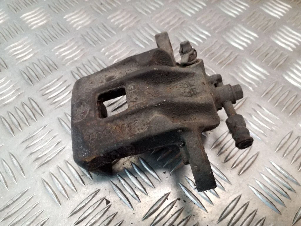 Rear brake caliper – right