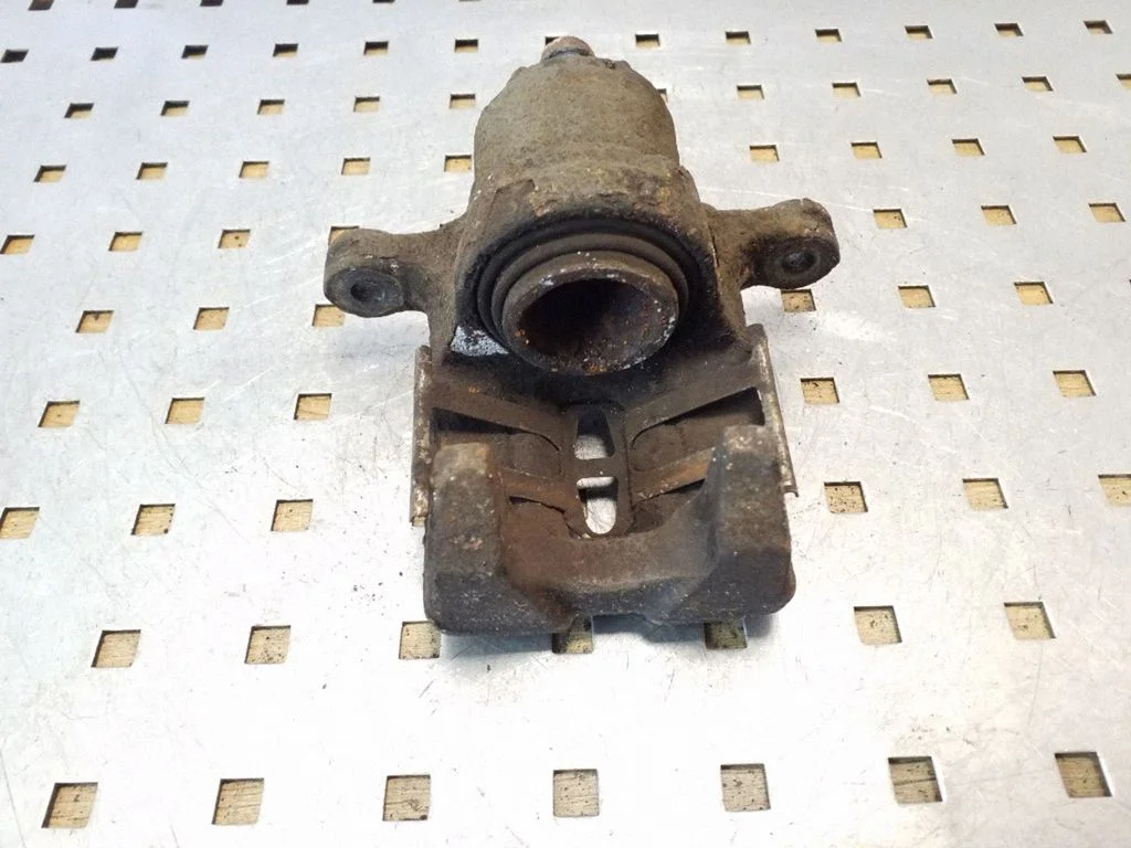 Rear brake caliper – rear left