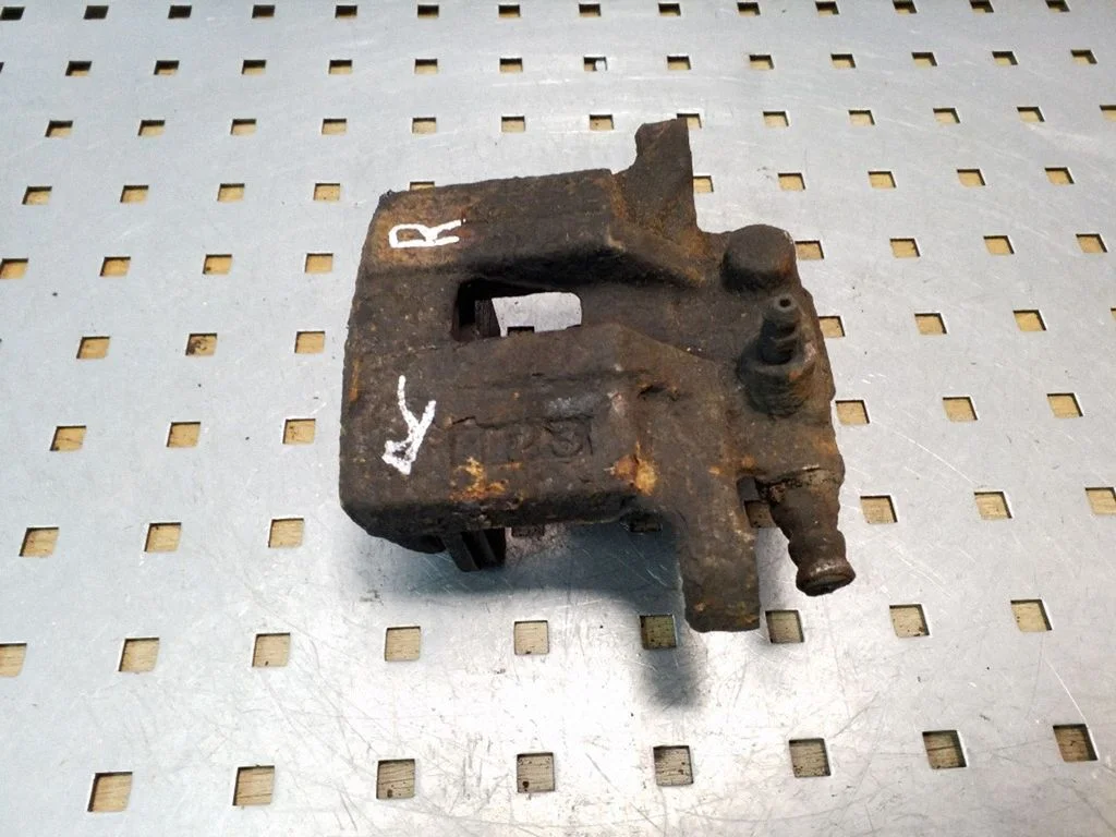 Rear brake caliper – right