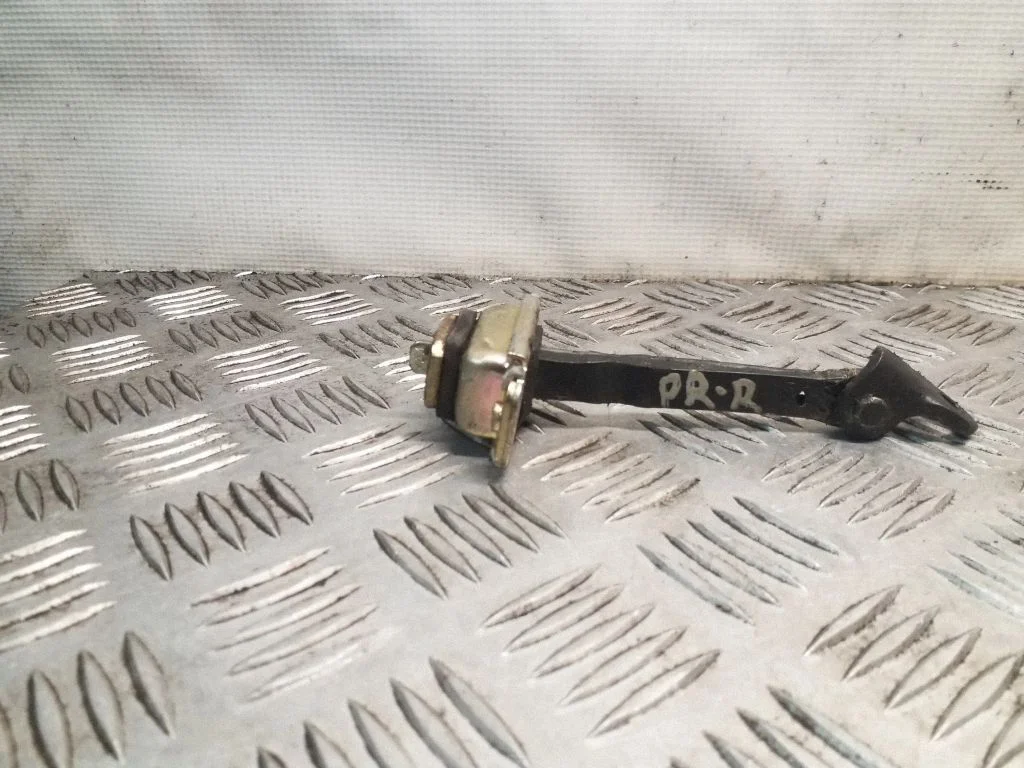 Front door check strap stopper – right