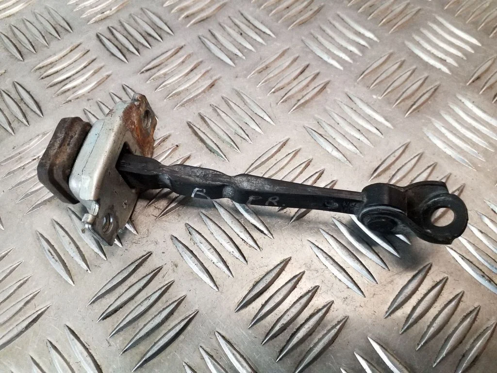 Front door check strap stopper – right