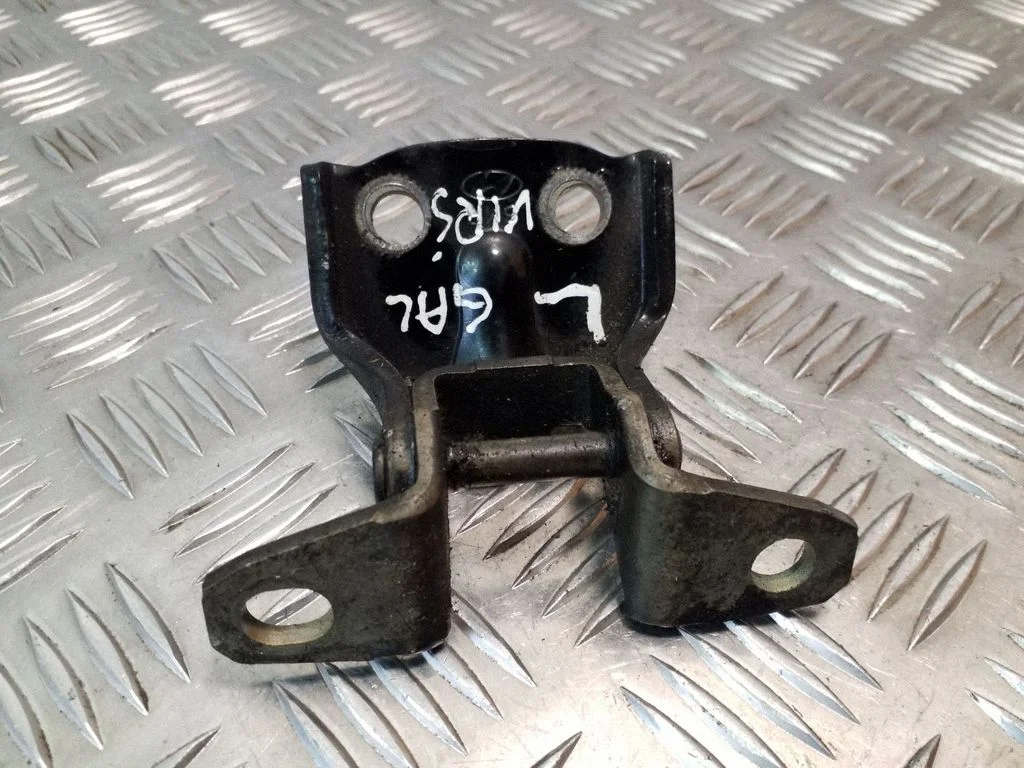 Rear door upper hinge – left