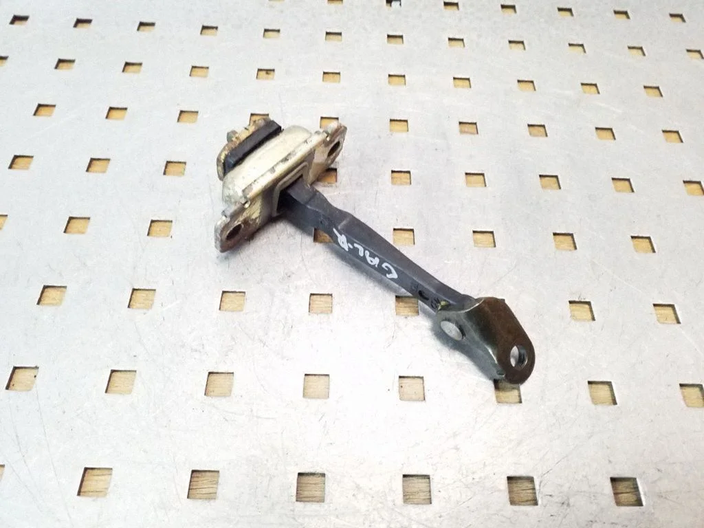 Rear door check strap stopper – right