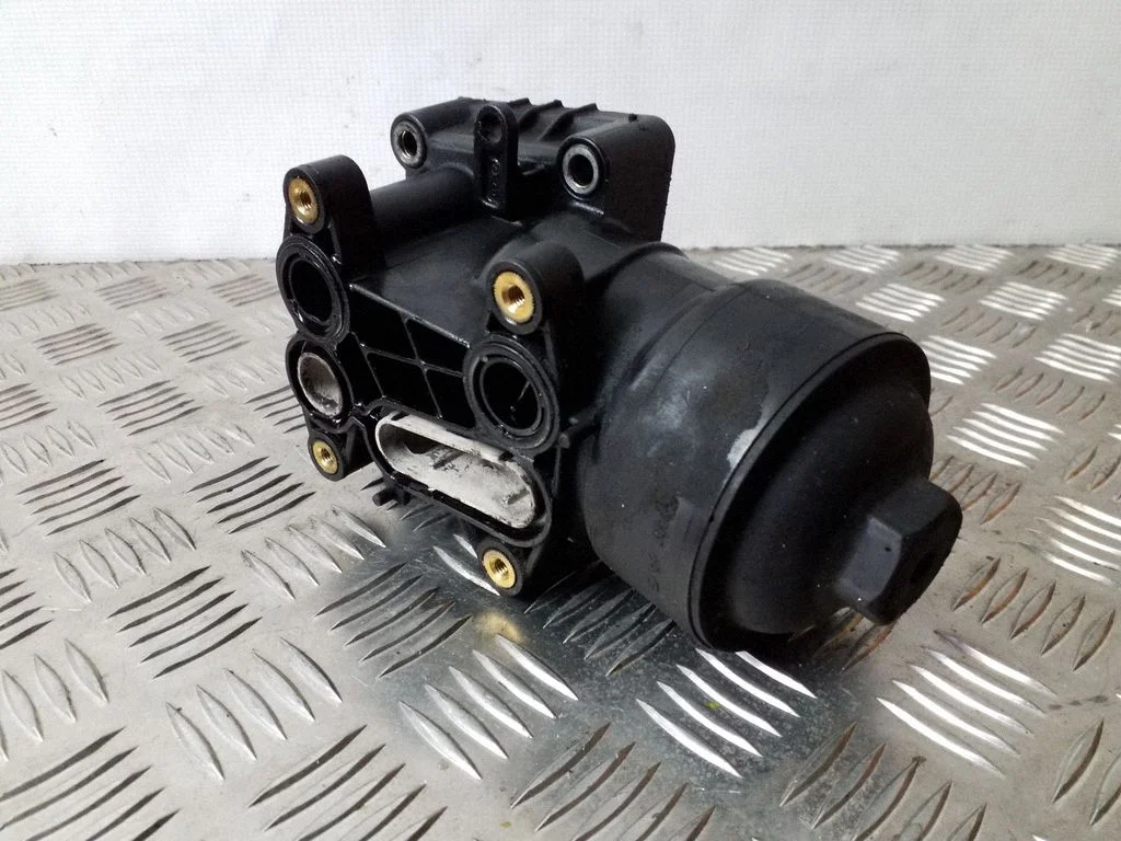 Eļļas filtra turētājs/dzesētājs 03L115380C