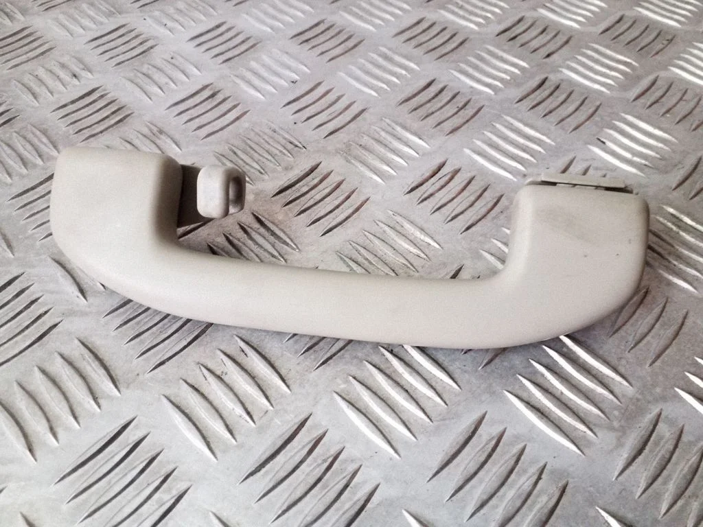 Rear interior roof grab handle – left