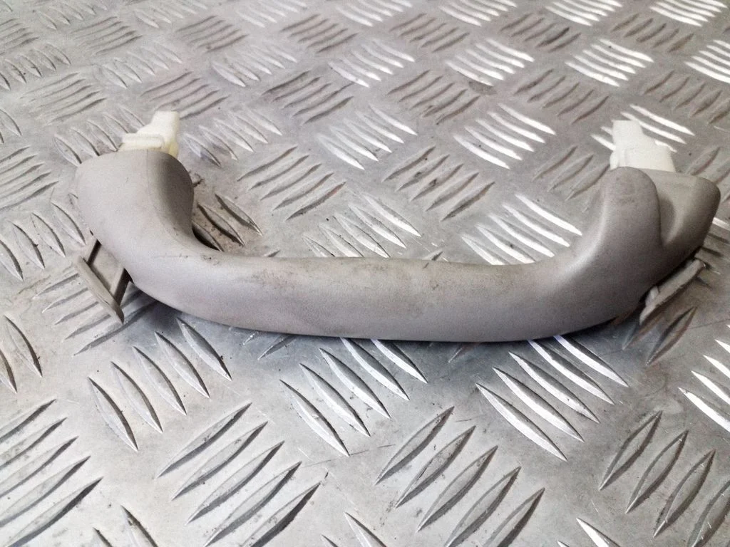 Rear interior roof grab handle – left