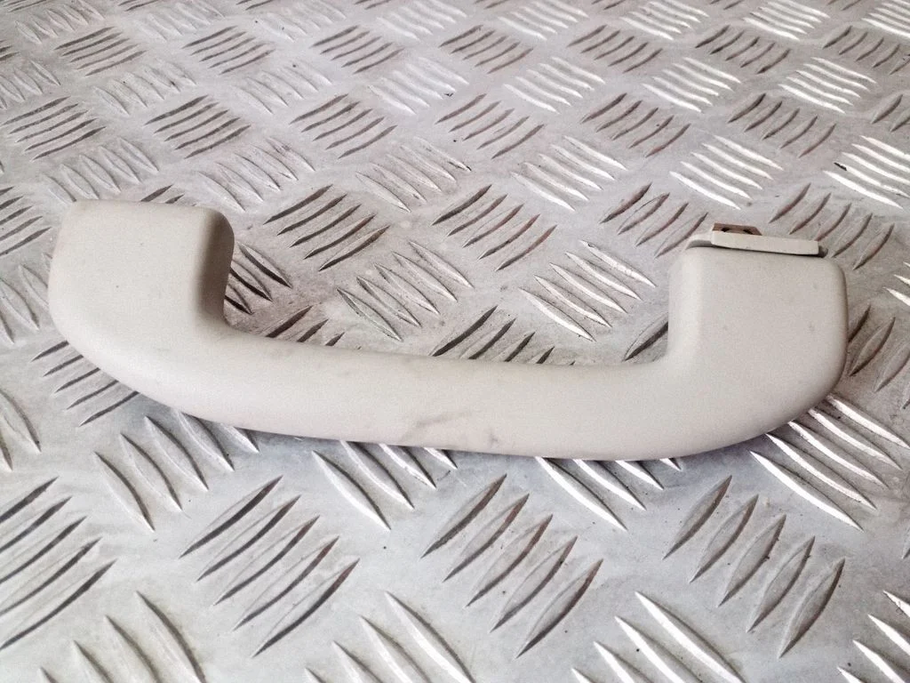 Front interior roof grab handle – left
