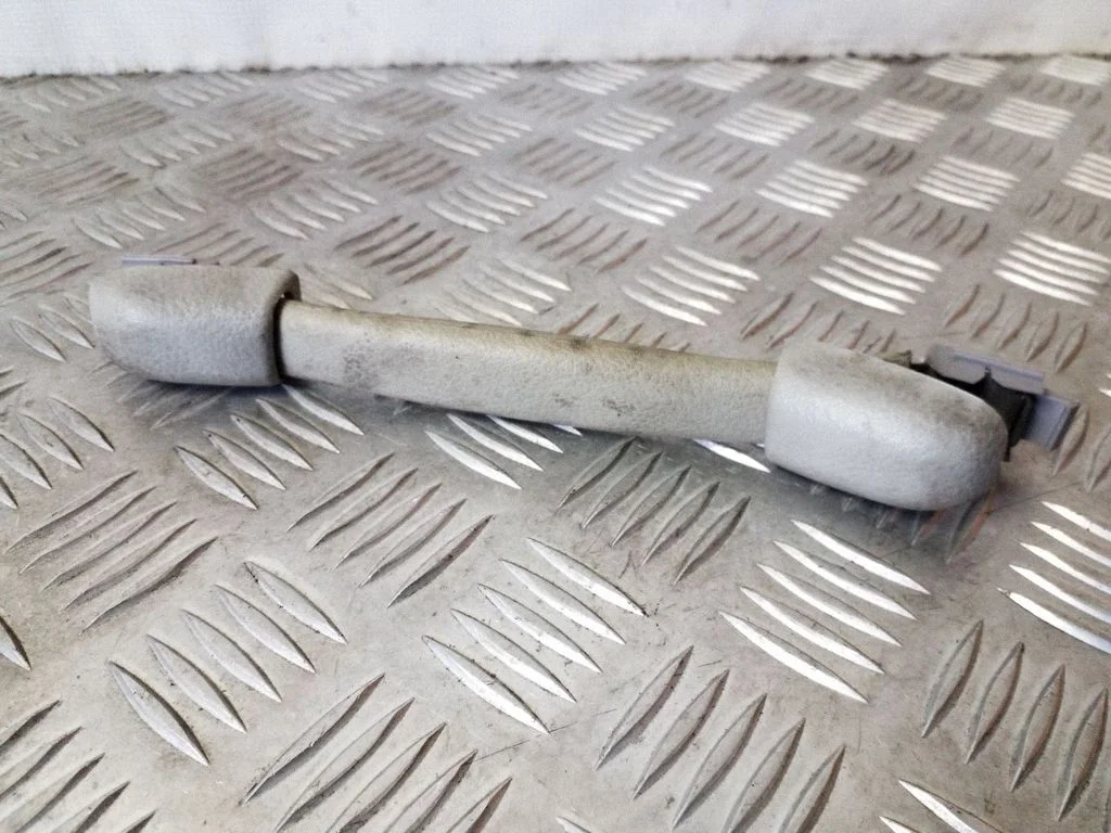 Front interior roof grab handle – left