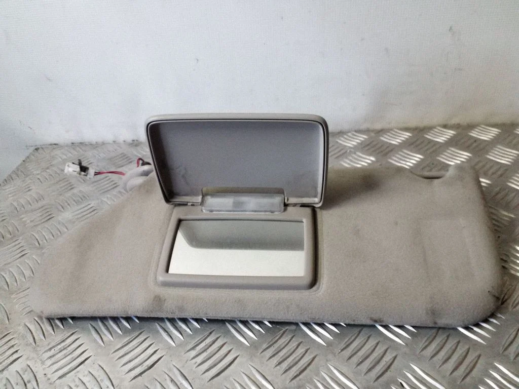Sun visor – left