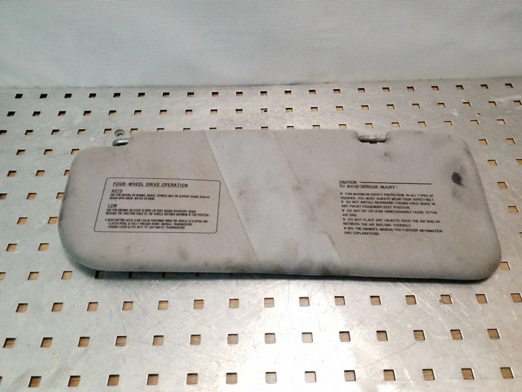 Sun visor – left