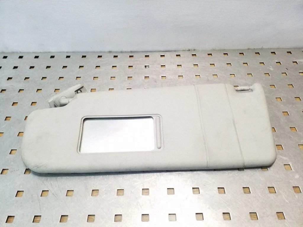 Sun visor – left