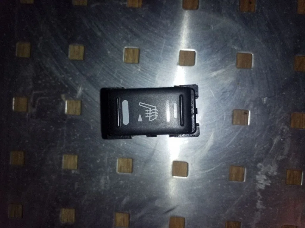 Seat heating switch