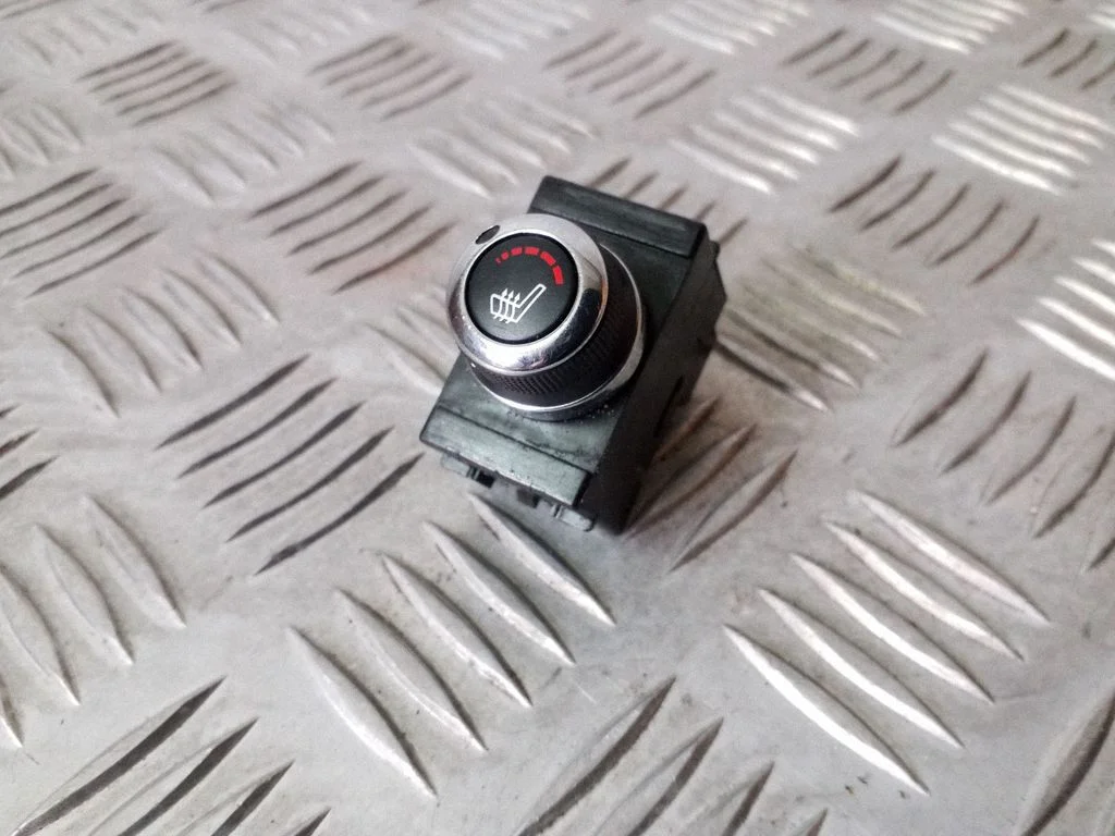 Seat heating switch