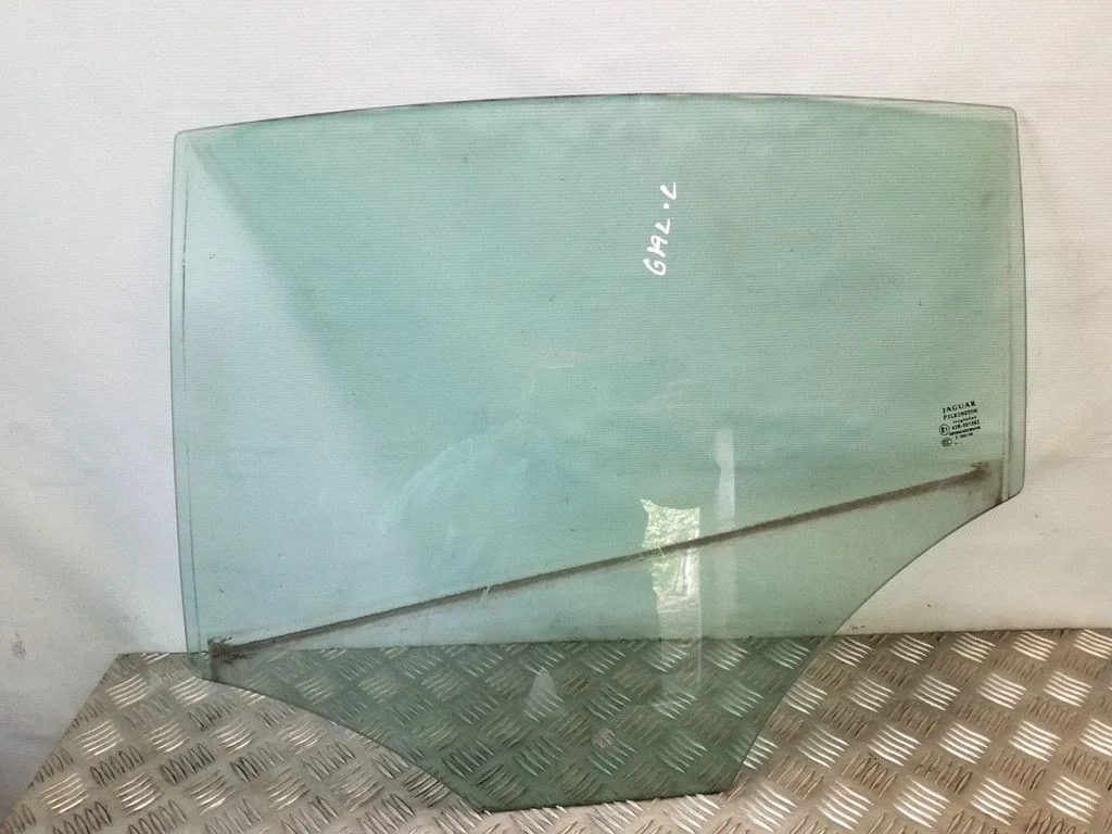 Rear door window glass – left