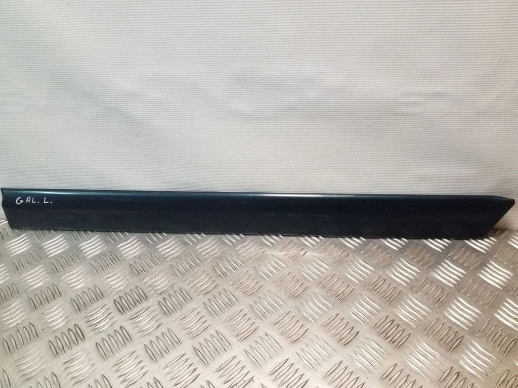 Rear door trim (molding) – left