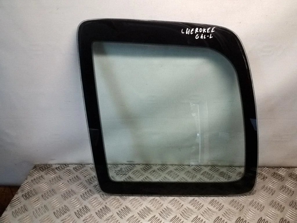 Rear side window – left