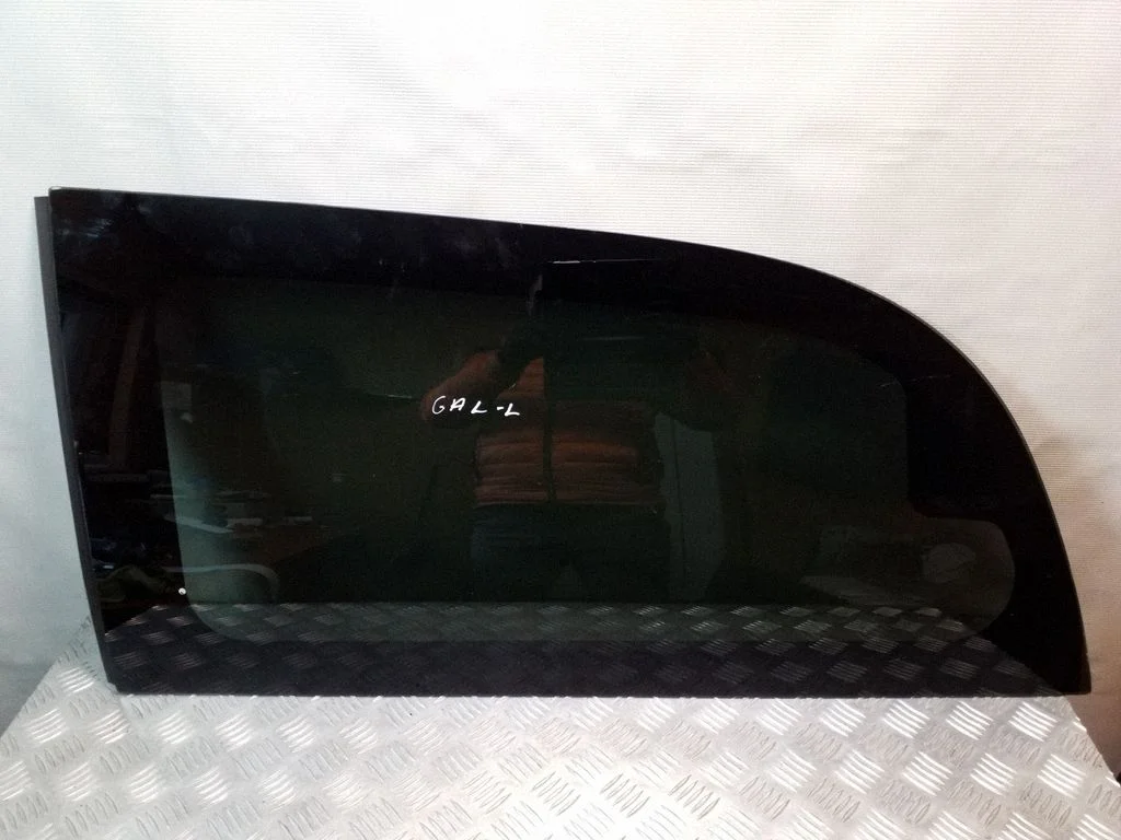 Rear side window – left