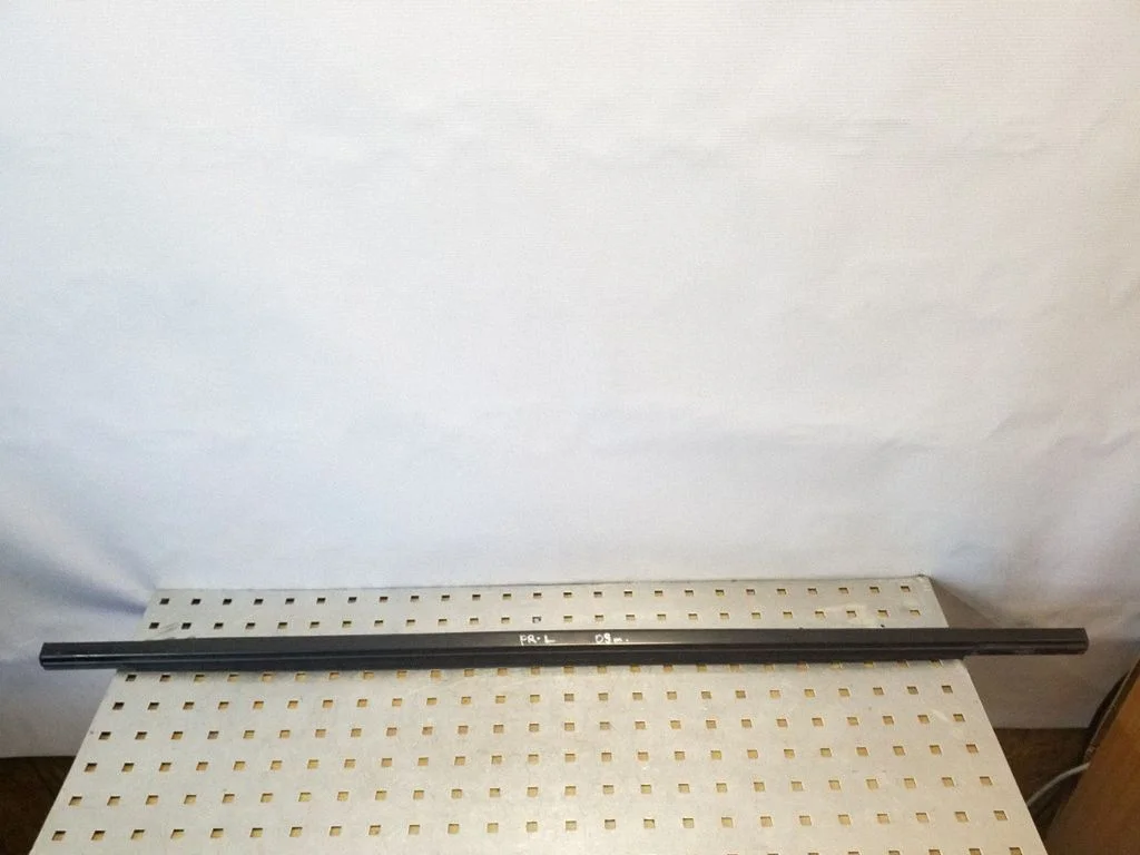 Front door glass trim molding – front left