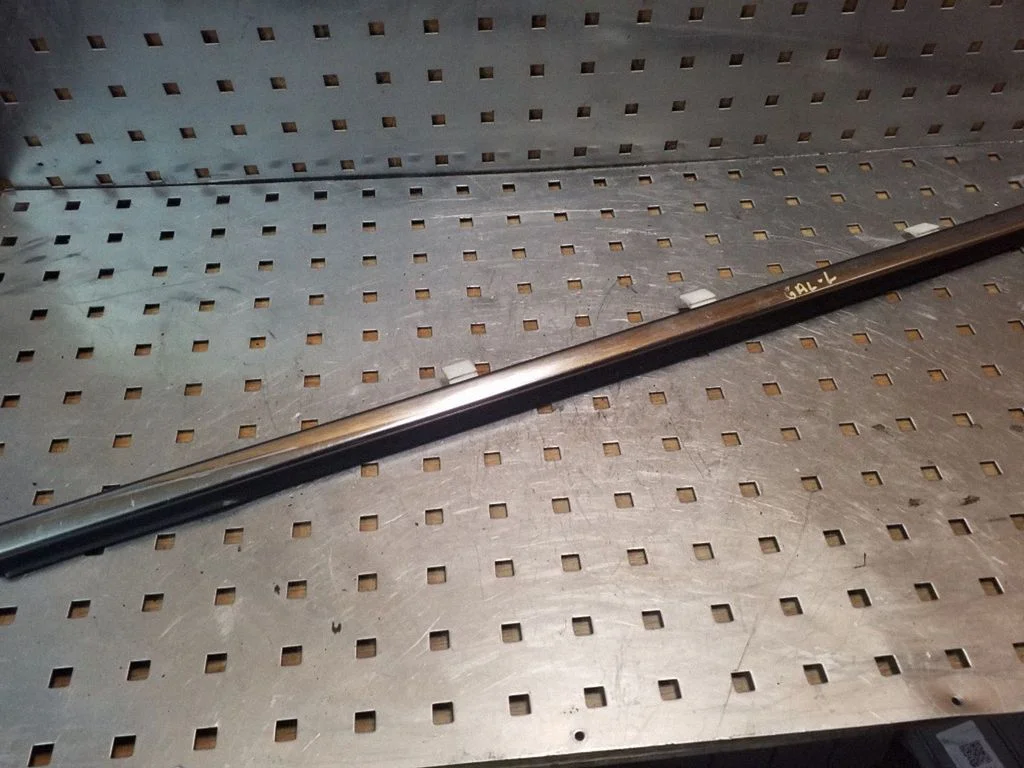 Rear door glass trim molding – rear left