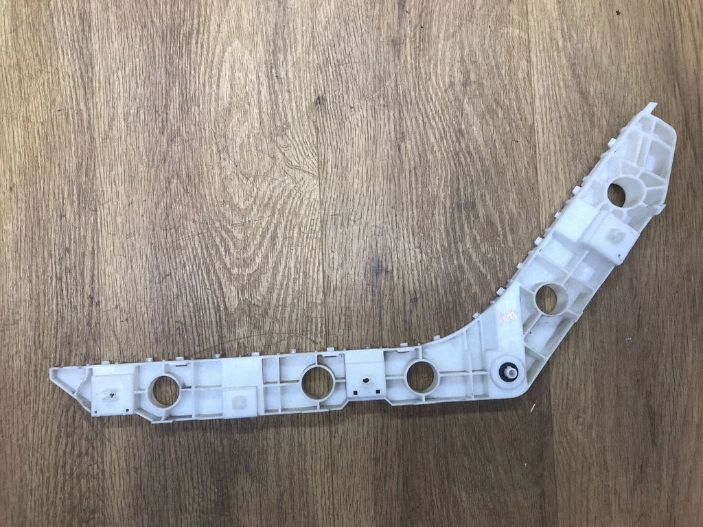 Rear bumper mounting bracket 85220