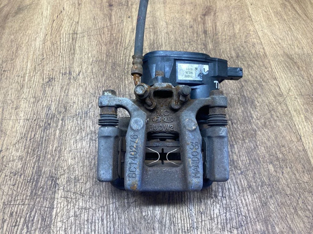 Rear brake caliper BC140276