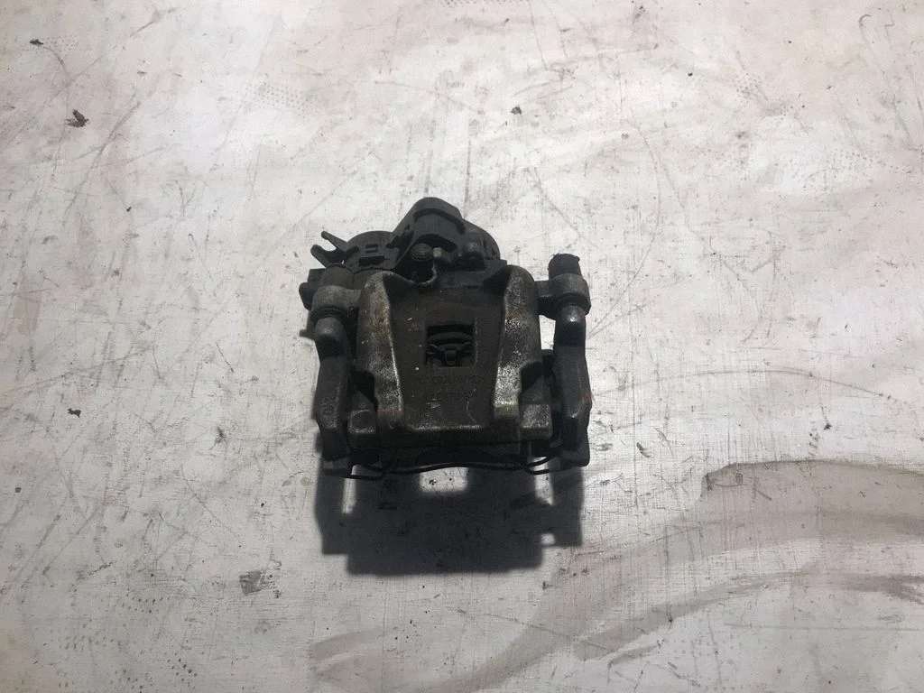 Rear brake caliper 32217364