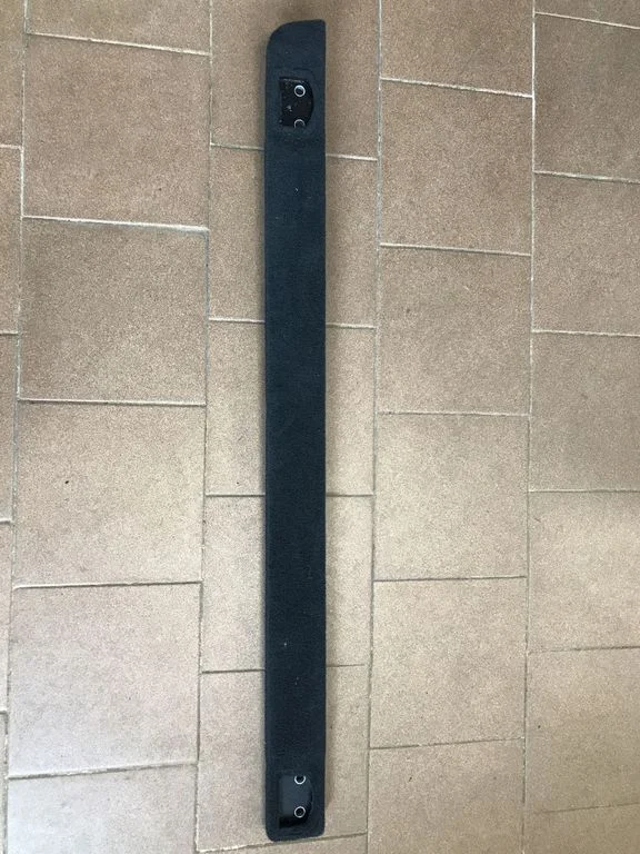 Kita bagažinės apdailos detalė