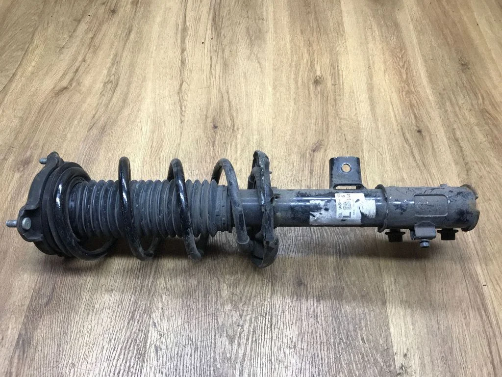 Front shock absorber with coil spring 54650F1530