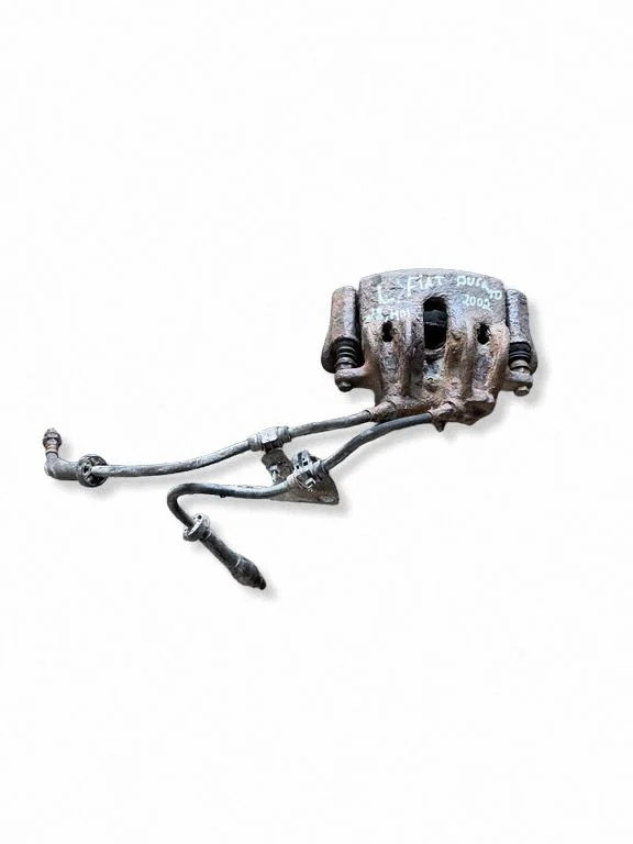 Front brake caliper – front left