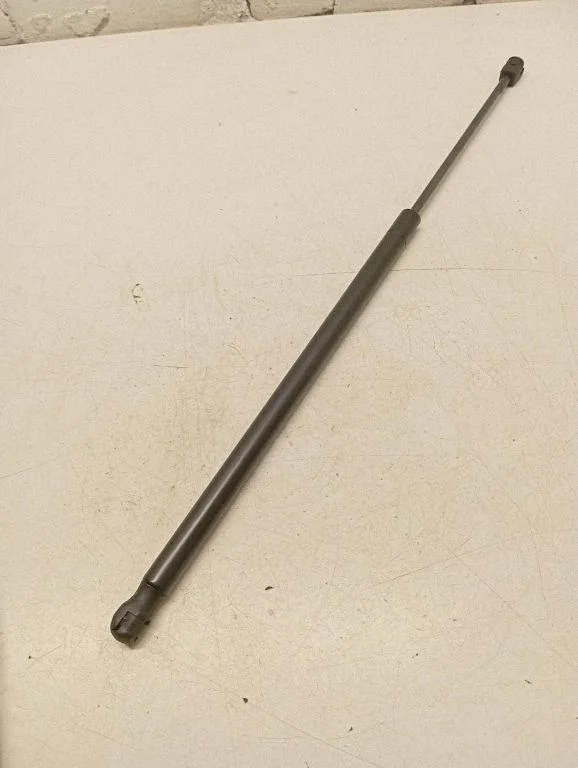 Front bonnet/hood damper/strut 15884559