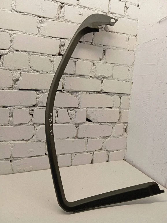 Kita galinių durų apdailos detalė