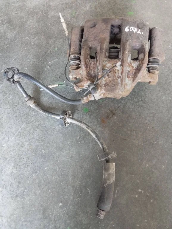 Front brake caliper – front left