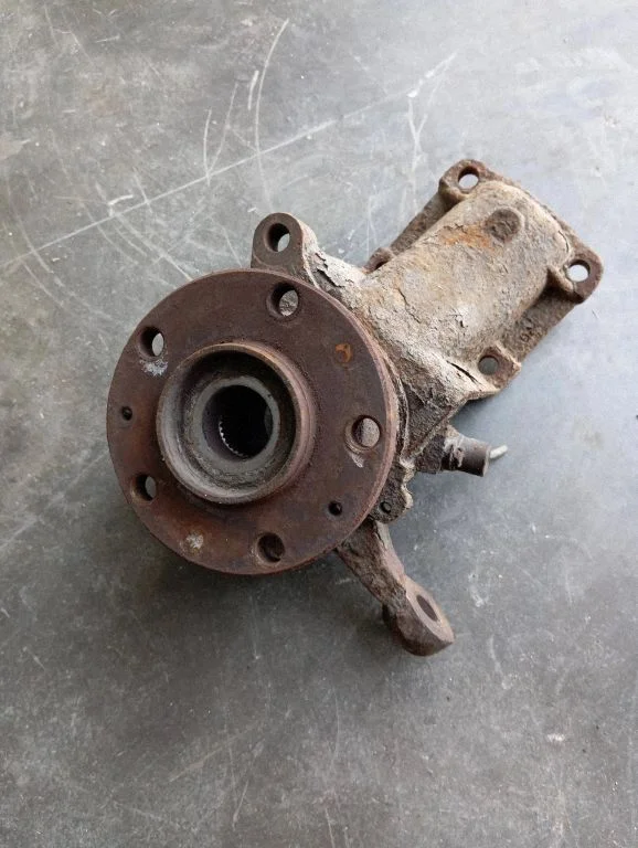 Front wheel hub spindle knuckle – front left