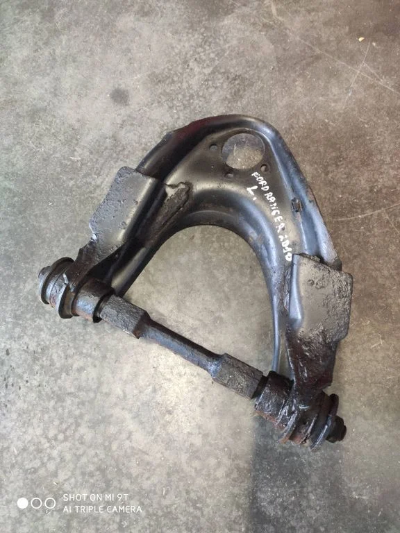 Front lower control arm/wishbone – front left