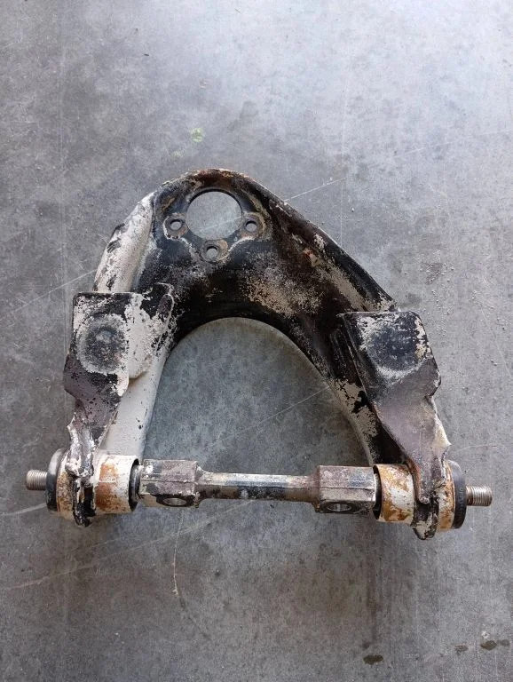 Front lower control arm/wishbone – front left
