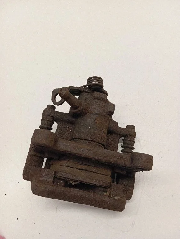 Rear brake caliper – rear left