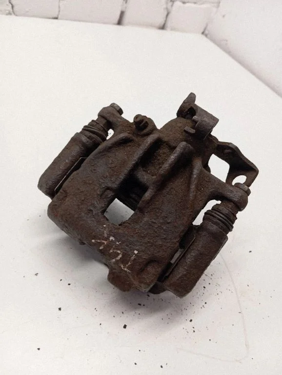 Rear brake caliper – rear left