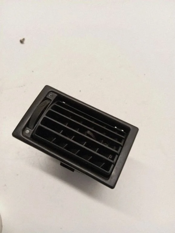 Dash center air vent grill 701819709A