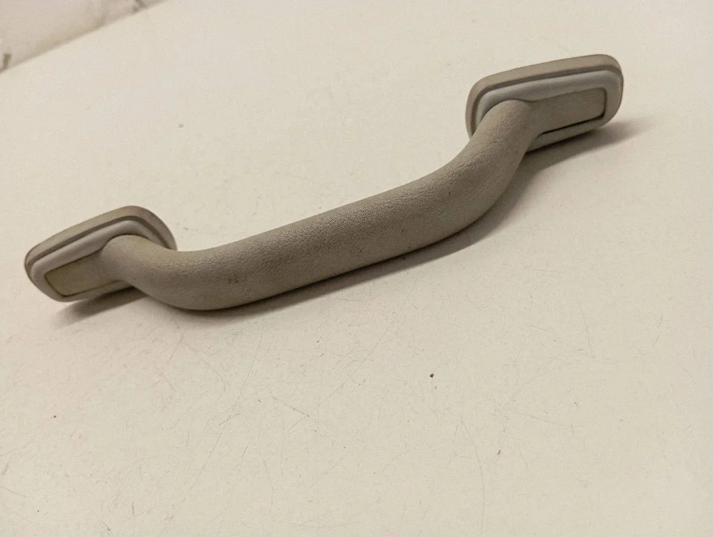 Front interior roof grab handle 705857607C