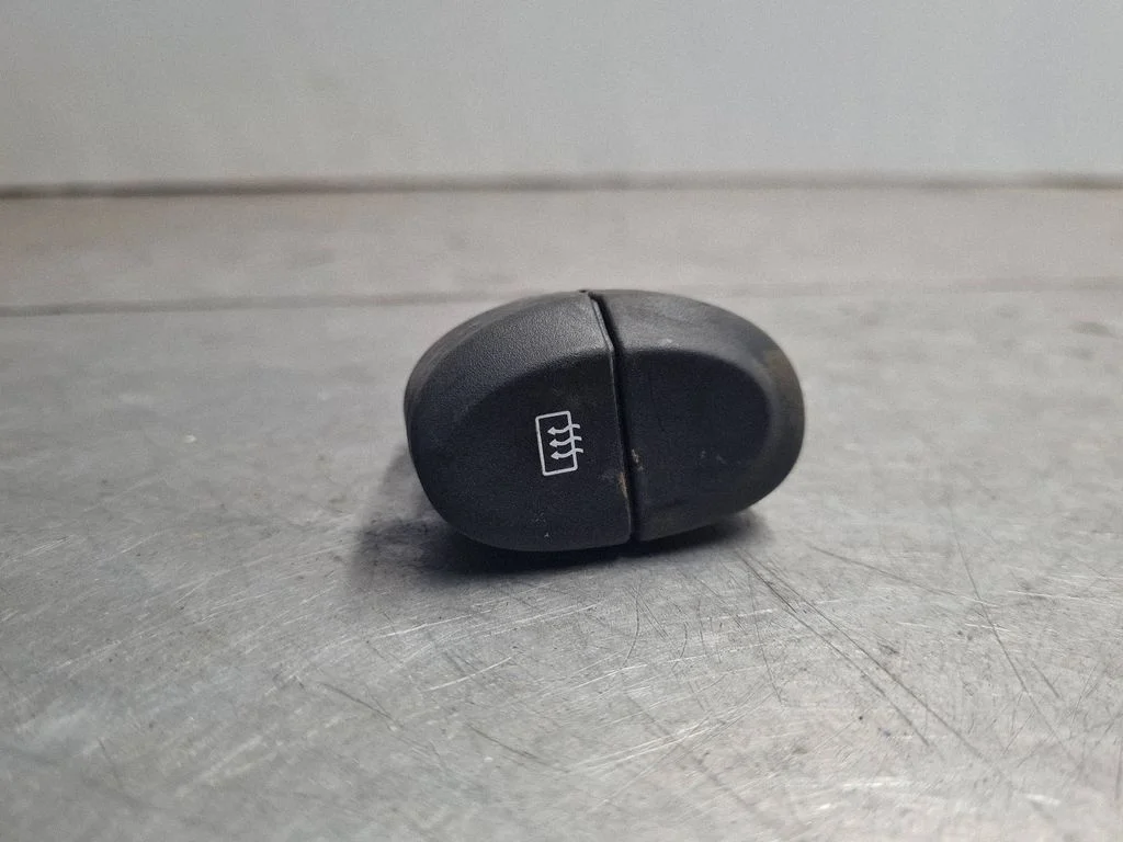 Przełącznik ogrzewania szyby 429990B