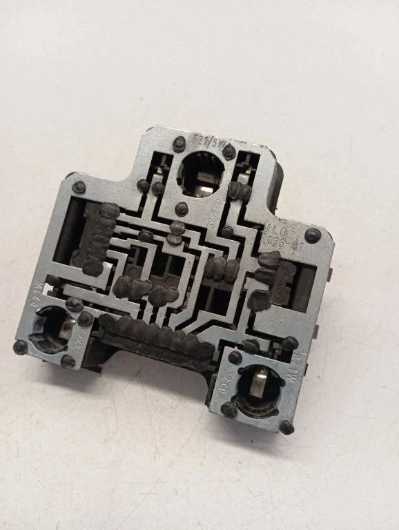 Tail light bulb cover holder 701945257