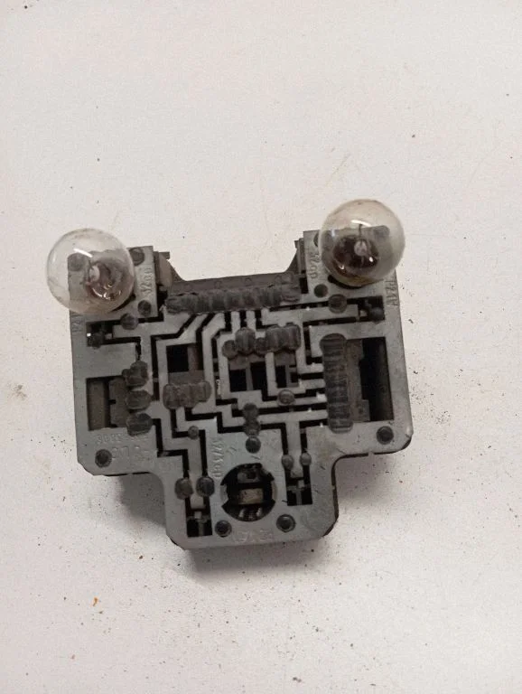 Tail light bulb cover holder 701945257